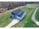 An elevated angle of the gray home and well manicured lawn at 2504 Hovis Rd, Lincolnton, NC 28092
