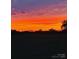 A stunning sunset view over the horizon with vibrant orange and purple colors at 2504 Hovis Rd, Lincolnton, NC 28092
