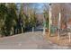 A scenic walking path surrounded by trees, providing a serene and accessible outdoor experience at 312 Motz Ave, Lincolnton, NC 28092