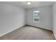 Bedroom featuring neutral carpet, light-colored walls, a window, and electrical outlets at 352 Anvil Draw Pl, Rock Hill, SC 29730