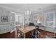 Bright home office featuring hardwood floors, chandelier lighting and a nice view to another room at 3608 Mcpherson St, Waxhaw, NC 28173