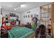 This playroom features a football field rug, sports-themed decor, and a built-in climbing gym at 3608 Mcpherson St, Waxhaw, NC 28173