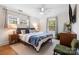 Bright bedroom featuring multiple windows providing natural light and a serene atmosphere at 5217 Addison Ave, Charlotte, NC 28211