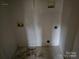 Compact laundry room with utility connections at 5315 Airport Dr, Charlotte, NC 28208