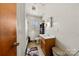 Bathroom with a shower, vanity sink, tiled floor, and a window that offers great natural light and ventilation at 5923 Charleston Ave, Kannapolis, NC 28081