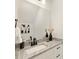 Modern bathroom featuring granite countertops and decorative accents at 6117 Grove Park Blvd, Charlotte, NC 28215