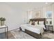 Comfortable main bedroom featuring a neutral color scheme, soft carpet, and natural light at 6117 Grove Park Blvd, Charlotte, NC 28215