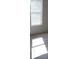 Bright bedroom features a sunlit window and neutral carpet at 630 Pinelake Dr, Troy, NC 27371