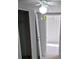 Hallway with open doorways and a ceiling fan in view at 630 Pinelake Dr, Troy, NC 27371