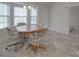 A cozy dining area with great natural light offering a calm and inviting space for meals with Gathering and friends at 8353 Emily Dr, Harrisburg, NC 28075