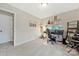 Home office/bedroom featuring neutral colored walls, plush carpet and plenty of natural light at 8701 Gainsford Ct, Charlotte, NC 28210