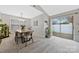 Dining room features a sliding door leading to a fenced backyard at 8701 Gainsford Ct, Charlotte, NC 28210