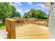 View of new wooden deck overlooking the backyard, great for entertaining at 110 Walters St, Huntersville, NC 28078