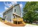 Beautiful home featuring a wooden deck and backyard area at 110 Walters St, Huntersville, NC 28078