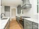 Contemporary kitchen with a large island, stainless steel appliances, and sleek gray cabinetry at 110 Walters St, Huntersville, NC 28078