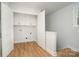 Functional laundry room featuring washer/dryer hookups and built-in cabinets for storage and organization at 110 Walters St, Huntersville, NC 28078