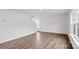 Bright open-concept living room with hardwood flooring and great natural light at 1113 Foxberry Ln, Maiden, NC 28650