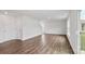Large, open living room area with hardwood floors and plenty of natural light at 1113 Foxberry Ln, Maiden, NC 28650