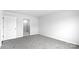 Neutral bedroom featuring carpeted floors, and ensuite bathroom entrance at 1117 Foxberry Ln, Maiden, NC 28650