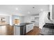 Modern kitchen featuring stainless steel appliances, granite countertops, and an island sink at 1117 Foxberry Ln, Maiden, NC 28650