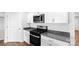 Well-equipped kitchen featuring granite countertops, stainless steel appliances, and modern cabinetry at 1117 Foxberry Ln, Maiden, NC 28650