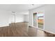 Bright living room featuring hardwood floors, a neutral color palette and sliding glass door to the outside at 1117 Foxberry Ln, Maiden, NC 28650