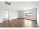 Bright living room featuring hardwood floors, a neutral color palette and natural light from the window at 1117 Foxberry Ln, Maiden, NC 28650