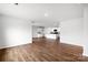 Spacious open-concept living area showcasing hardwood floors and a modern, neutral color palette at 1117 Foxberry Ln, Maiden, NC 28650