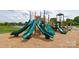 Community playground featuring multiple slides and climbing features at 1117 Foxberry Ln, Maiden, NC 28650