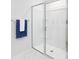 Modern glass enclosed shower with a towel rack provides clean lines and convenience at 1129 Foxberry Ln, Maiden, NC 28650
