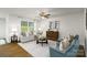 Comfortable living room featuring neutral tones, modern furniture, and lots of natural light at 1129 Foxberry Ln, Maiden, NC 28650