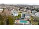 Back of home featuring a spacious backyard, a well-kept lawn, and a private fenced-in pool at 11307 Celandine Ct, Charlotte, NC 28213