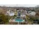 Back of home featuring a spacious backyard, a well-kept lawn, and a private fenced-in pool at 11307 Celandine Ct, Charlotte, NC 28213
