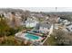 Back of home featuring a spacious backyard, a well-kept lawn, and a private fenced-in pool at 11307 Celandine Ct, Charlotte, NC 28213