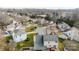 An aerial view showcases a residential neighborhood with well-maintained lawns and mature trees at 11307 Celandine Ct, Charlotte, NC 28213