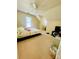 Bedroom with a ceiling fan, large window for natural light, and a bed and TV for comfortable living at 11307 Celandine Ct, Charlotte, NC 28213