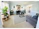 Inviting living room with plush seating, natural light, and a decorative rug at 11307 Celandine Ct, Charlotte, NC 28213