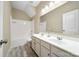 Bathroom featuring a double sink vanity, shower-tub, and ample counter space at 119 Front Porch Dr # 46, Rock Hill, SC 29732