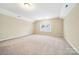 Spacious bedroom with a large window and neutral carpeting at 119 Front Porch Dr # 46, Rock Hill, SC 29732