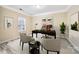 Bright home office with a sleek desk, comfortable seating area, and natural light from the window at 119 Front Porch Dr # 46, Rock Hill, SC 29732