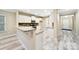 Updated kitchen featuring granite countertops, stainless appliances, breakfast bar, and sleek white cabinetry at 119 Front Porch Dr # 46, Rock Hill, SC 29732