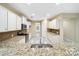 Well-lit kitchen with stainless steel appliances, granite countertops, and ample cabinet space at 119 Front Porch Dr # 46, Rock Hill, SC 29732