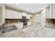 Modern kitchen with granite countertops, stainless steel appliances, and white cabinets at 119 Front Porch Dr # 46, Rock Hill, SC 29732