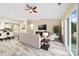 Open-concept living area with ceiling fan, modern decor, and dining space, creating a comfortable and stylish home at 119 Front Porch Dr # 46, Rock Hill, SC 29732