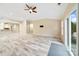 Open living room with luxury vinyl plank flooring and kitchen in the background at 119 Front Porch Dr # 46, Rock Hill, SC 29732