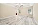 Spacious main bedroom with tray ceiling, ceiling fan, and large windows offering plenty of natural light at 119 Front Porch Dr # 46, Rock Hill, SC 29732