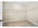 Walk-in closet with carpet and wire shelving for ample storage at 119 Front Porch Dr # 46, Rock Hill, SC 29732