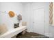 Bright mudroom featuring a bench with storage, coat hooks, and stylish decor at 119 Stonewater Dr # 22, Red Cross, NC 28129