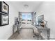 Functional office space with two workstations, natural light, and neutral decor at 119 Stonewater Dr # 22, Red Cross, NC 28129