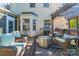 Back deck boasts a grill, dining area, and seating around a fire pit at 12112 Autumn Winds Ln, Pineville, NC 28134